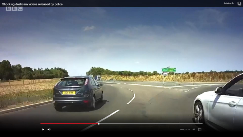 BMW exiting roundabout.jpg